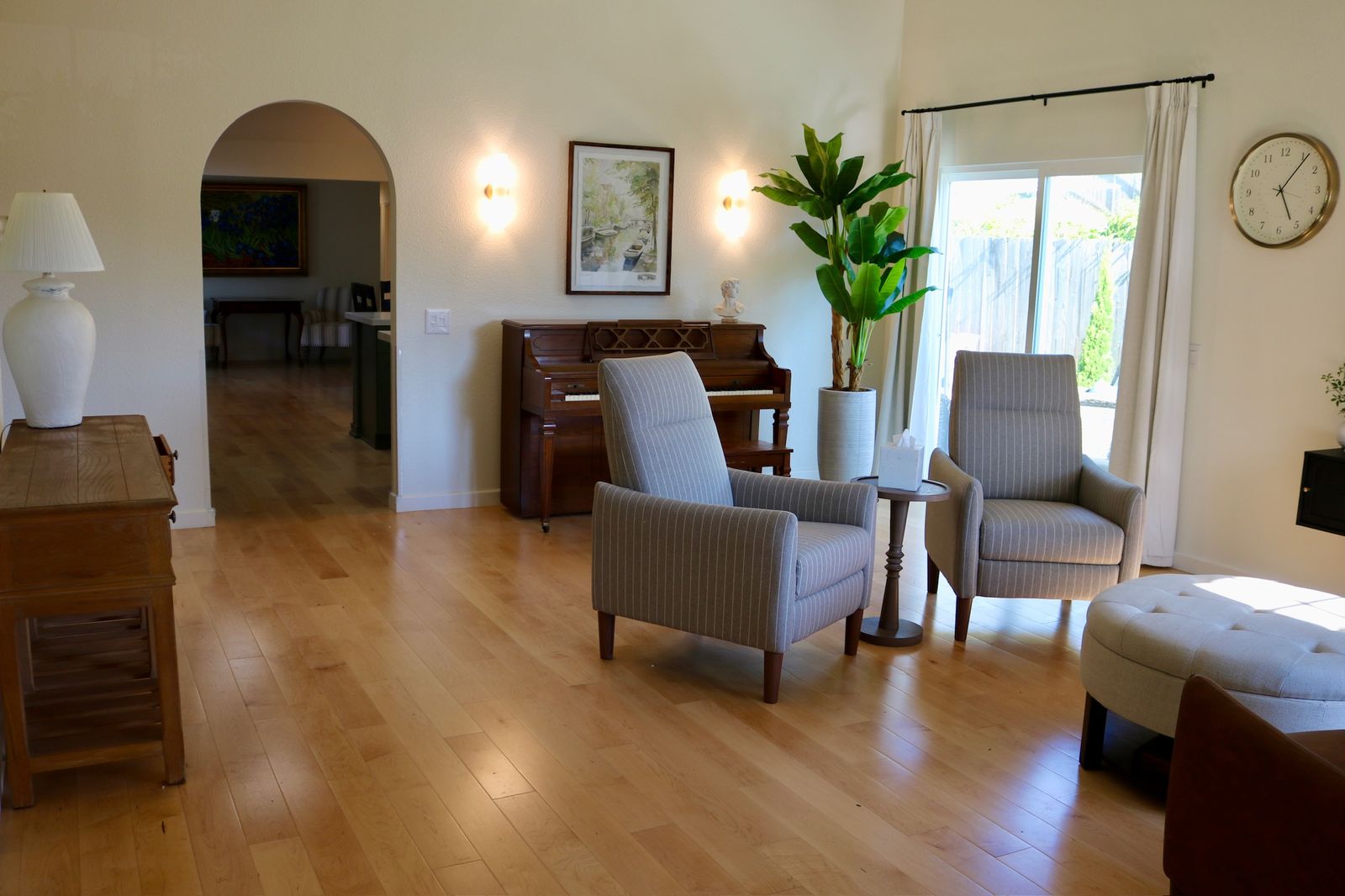 Second view of the bright living room at Olive Tree Elderly Homes